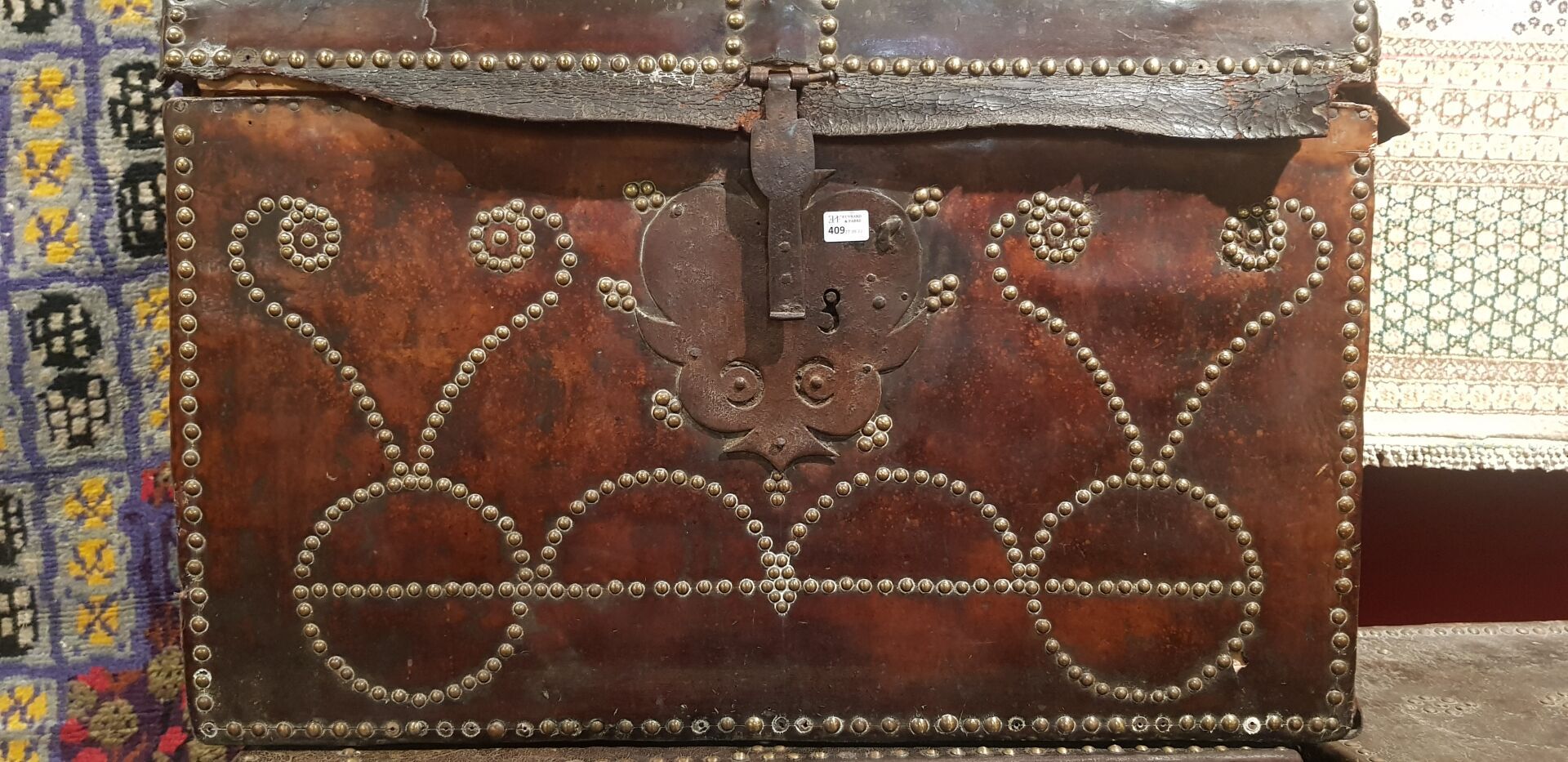 Null Exotic wood chest covered with leather and decorated with studded rniceaux
&hellip;