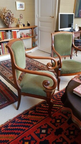 Null Pair of armchairs with reversed back and two scrolled arms

XIXth century