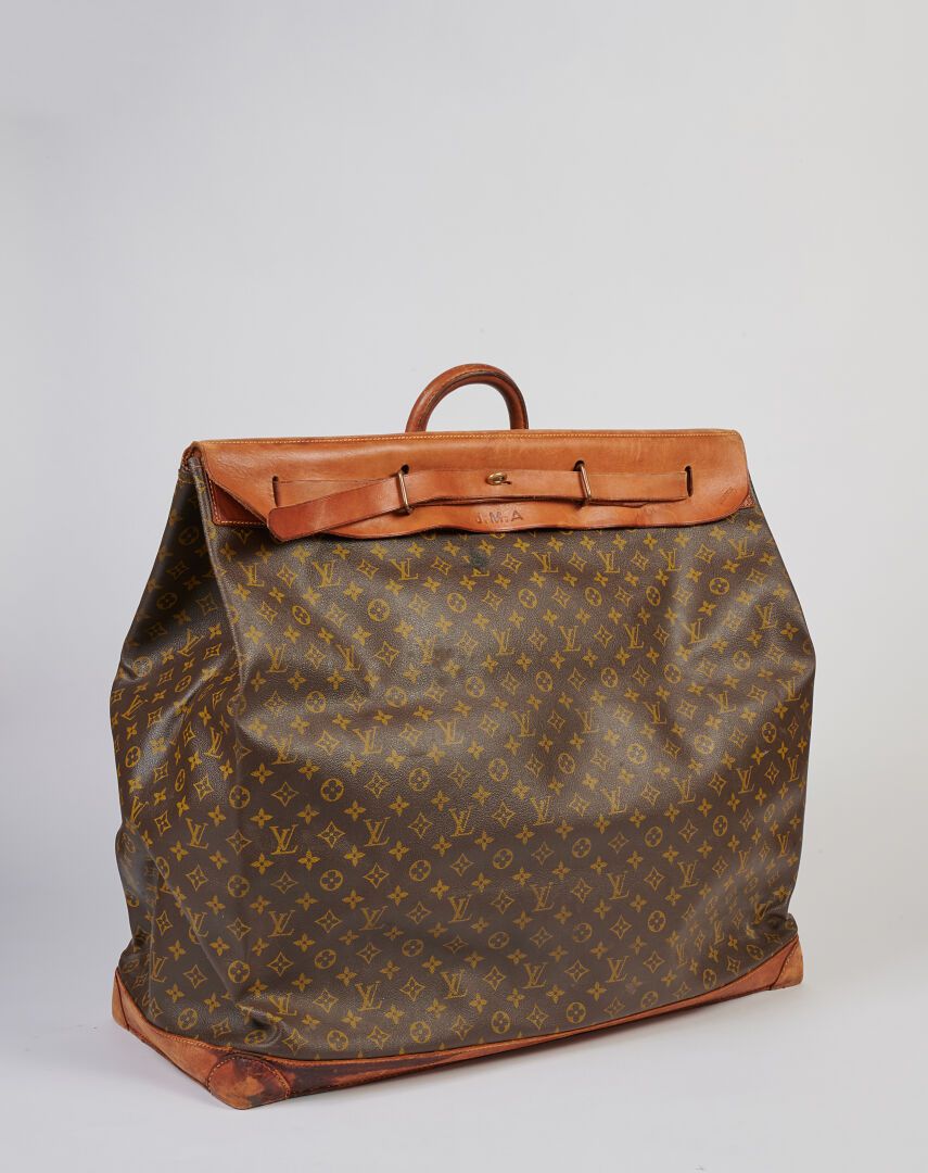 Null Louis VUITTON
Steamer Bag en toile Monogram et cuir naturel, chiffré J.M.A
&hellip;