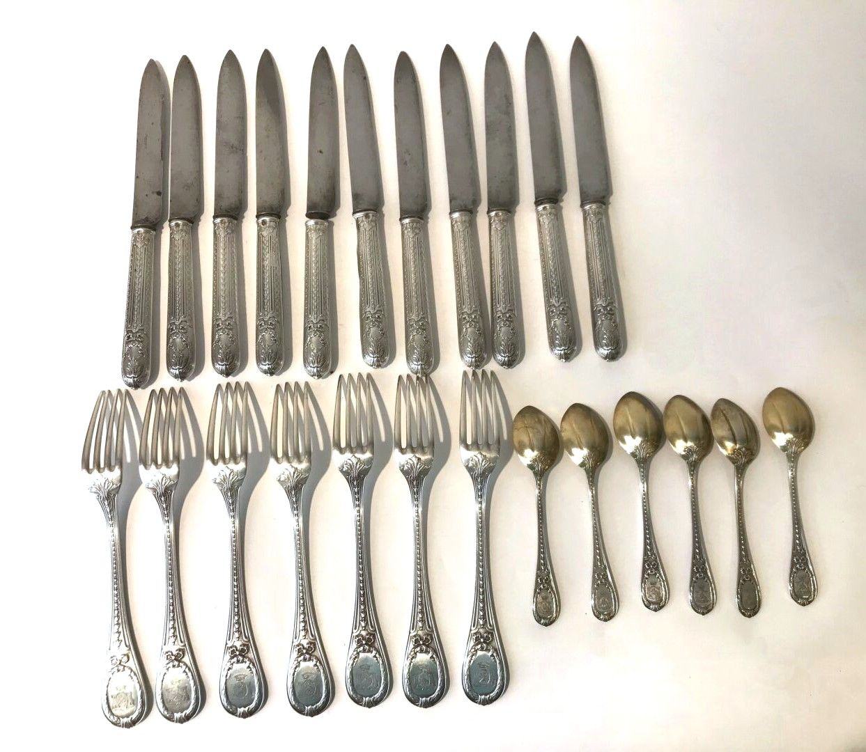 Null Lot including:
Seven table forks in silver 1st title 950‰, Louis XVI style,&hellip;