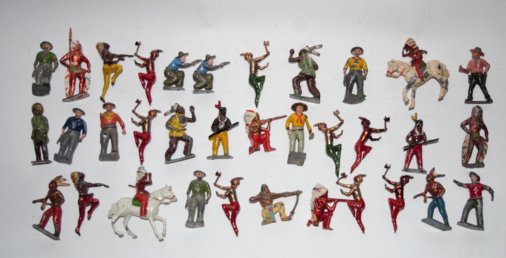 Null BRITAINS/CRESCENT TOYS: set of +/- 30 Cowboys and Indians. Good and used co&hellip;