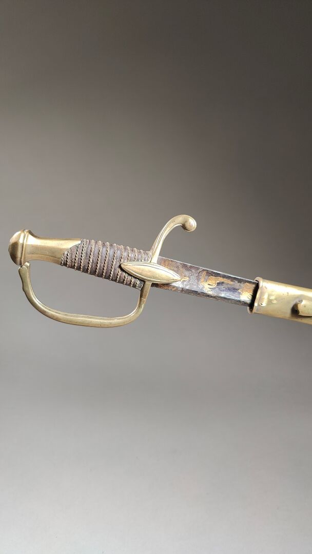 Null France: Infantry officer's saber.
Brass mounting, filigree handle, oreillon&hellip;