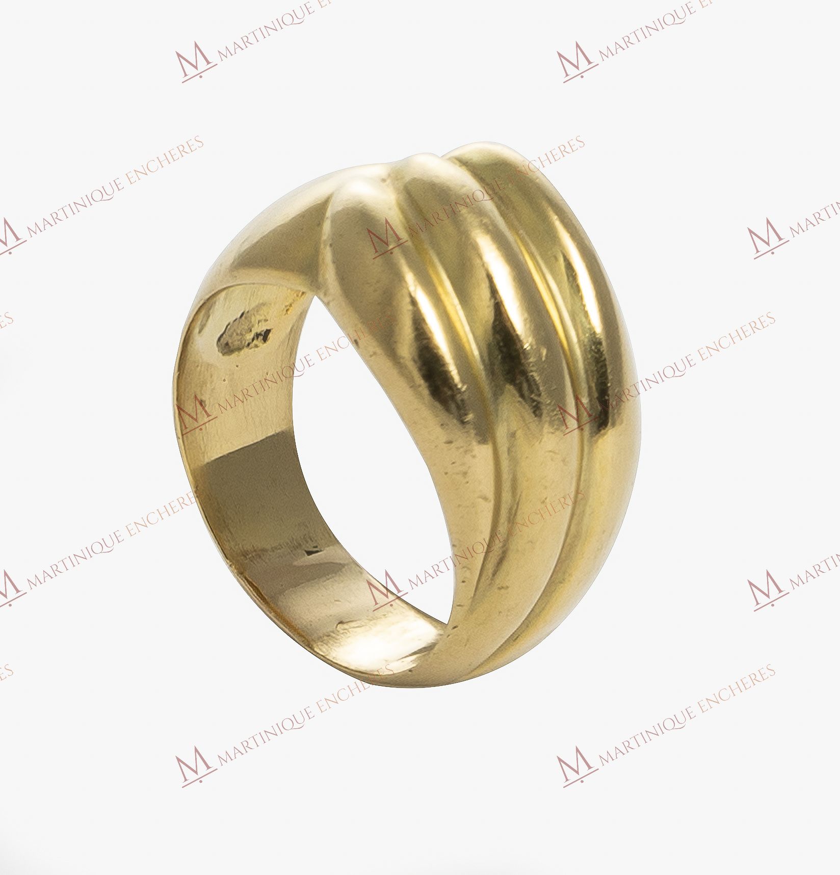 Null Ring godron in yellow gold 750 thousandths 18K.
Weight : 5,48 g.
TDD 61.