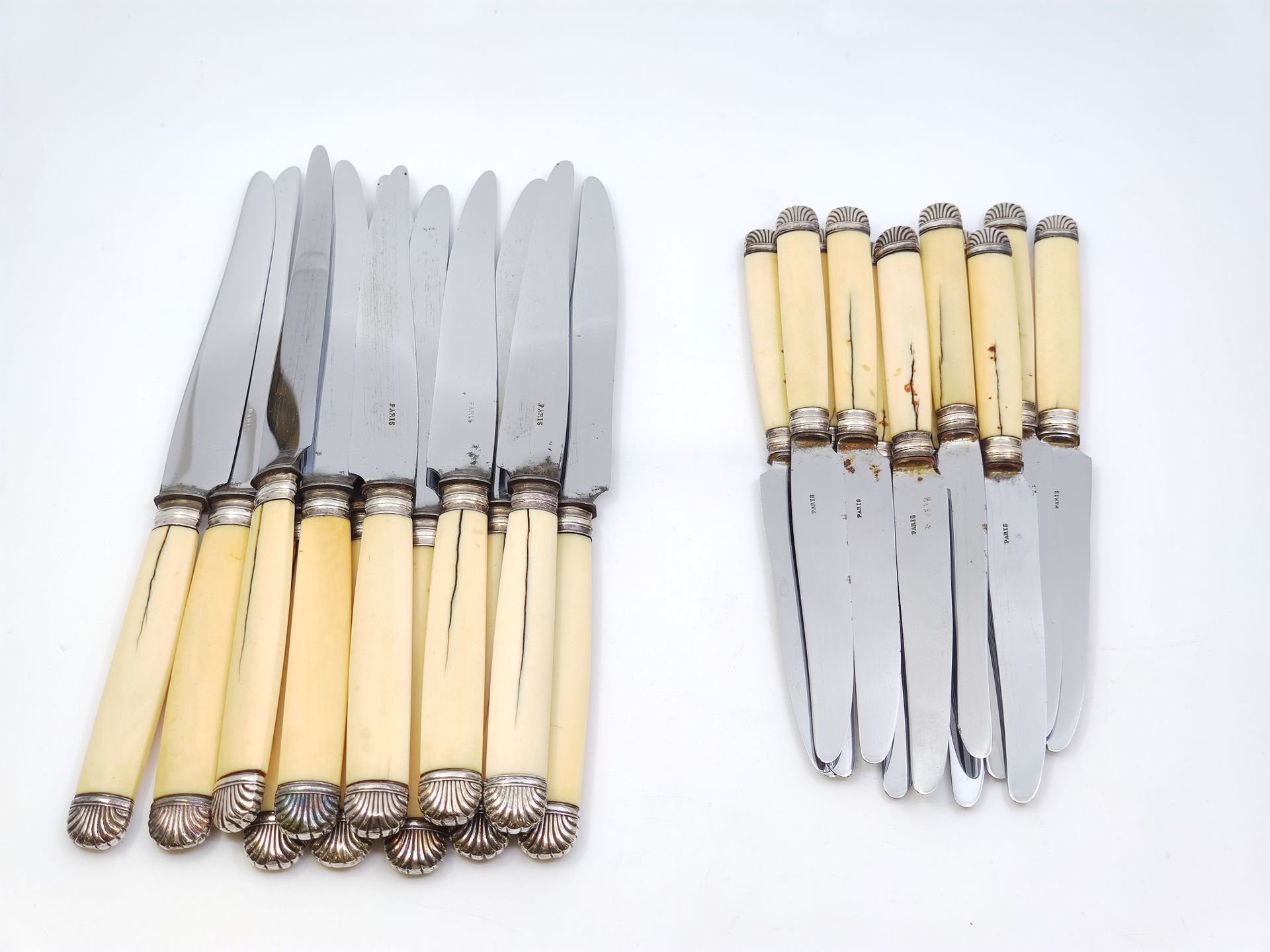 Null 
DOUZE couteaux de table en métal argenté, lame inox, manche os




DOUZE c&hellip;
