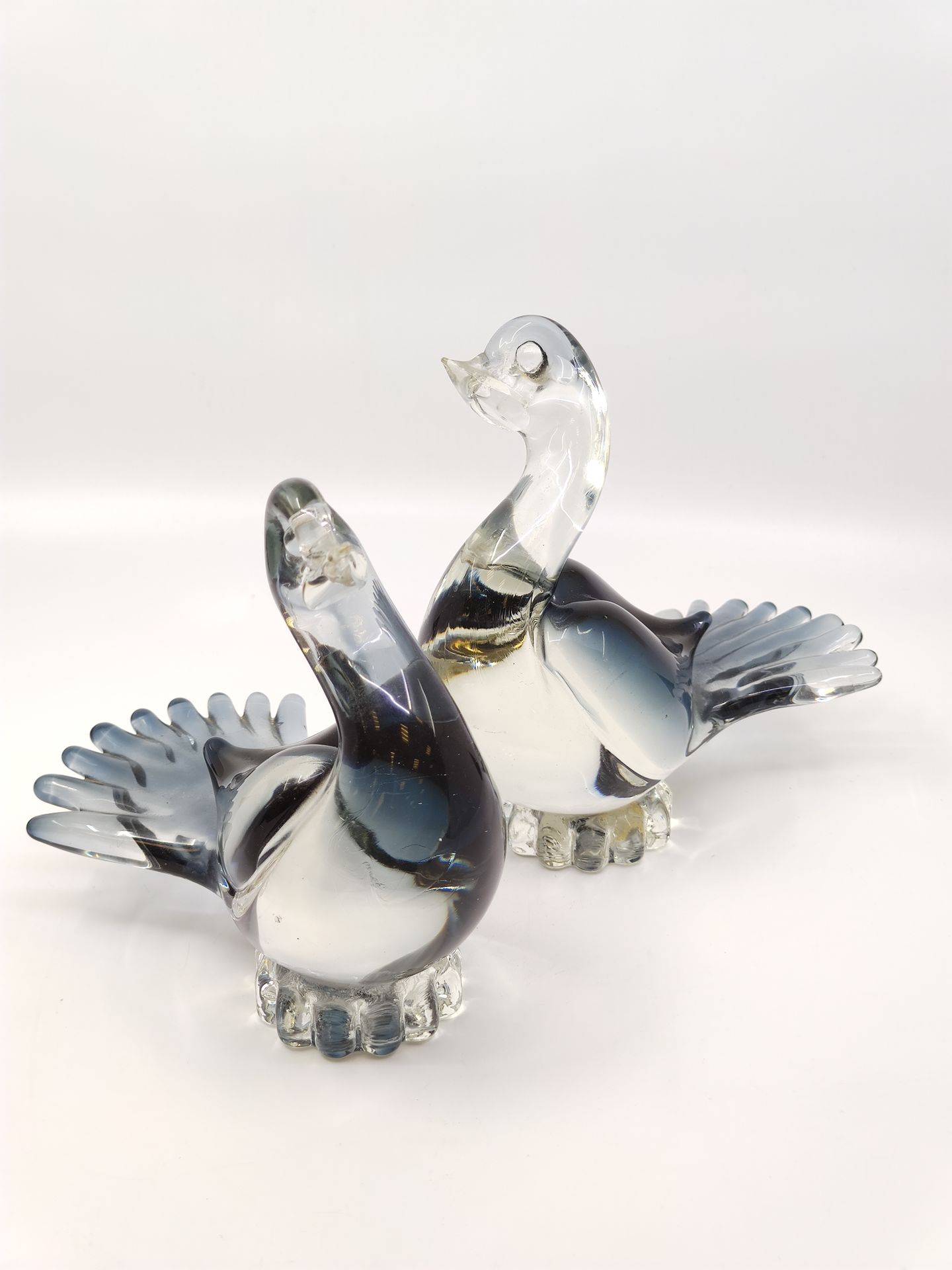 Null MURANO - 

Deux oiseaux en cristal bleu

Dim : 16 cm