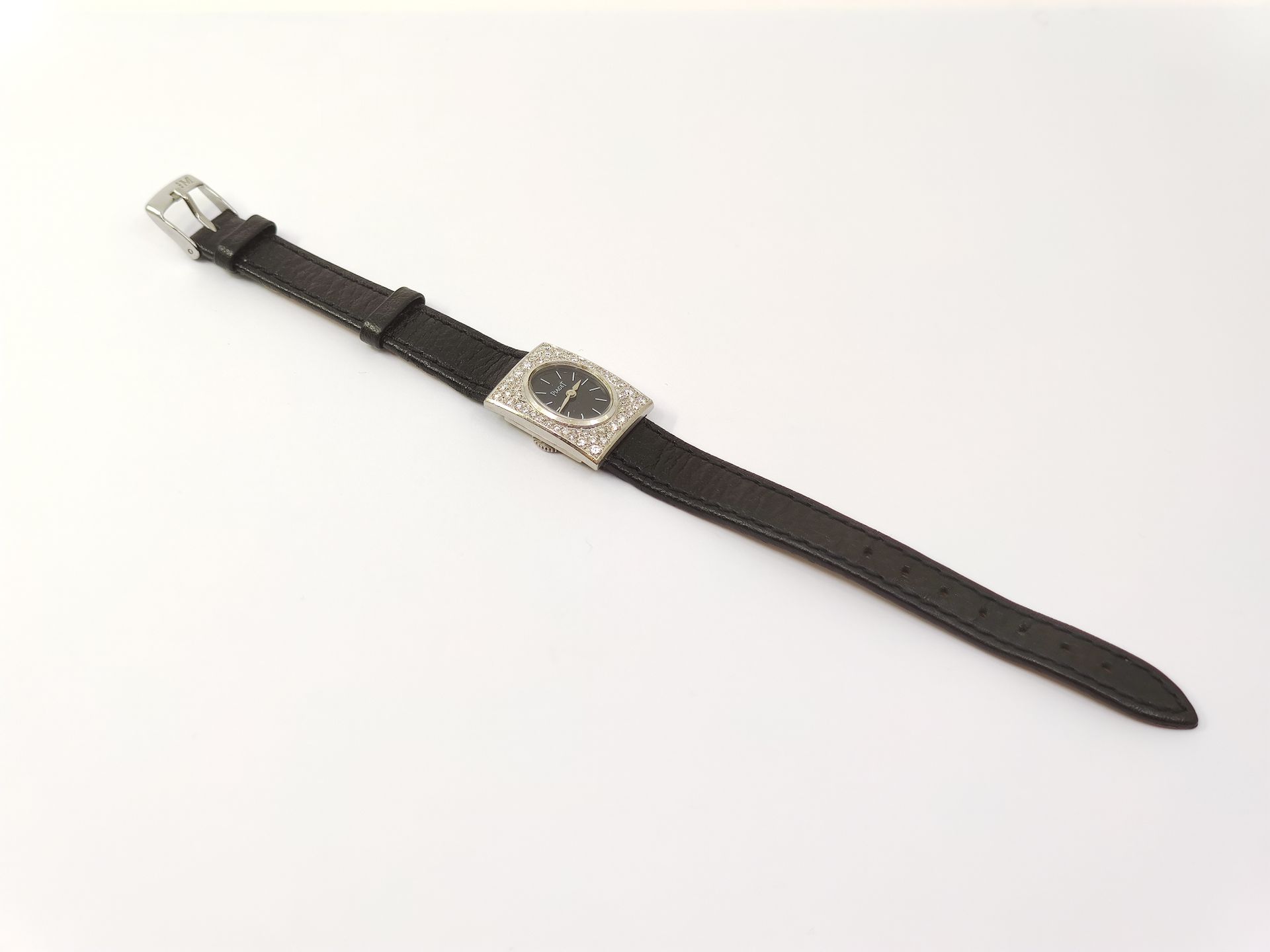 Null 
PIAGET




Montre bracelet de dame, boitier rectangulaire en or gris pavé &hellip;