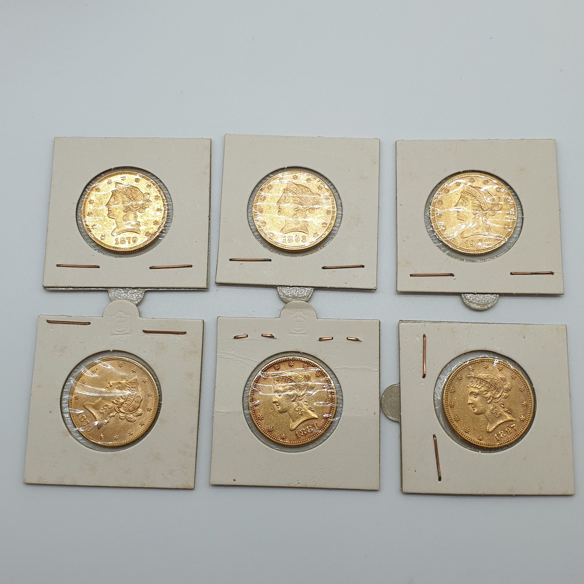 Null 1893/1879/1901/1881/1897/1879六枚10美元金币拍品

在吸塑包装中