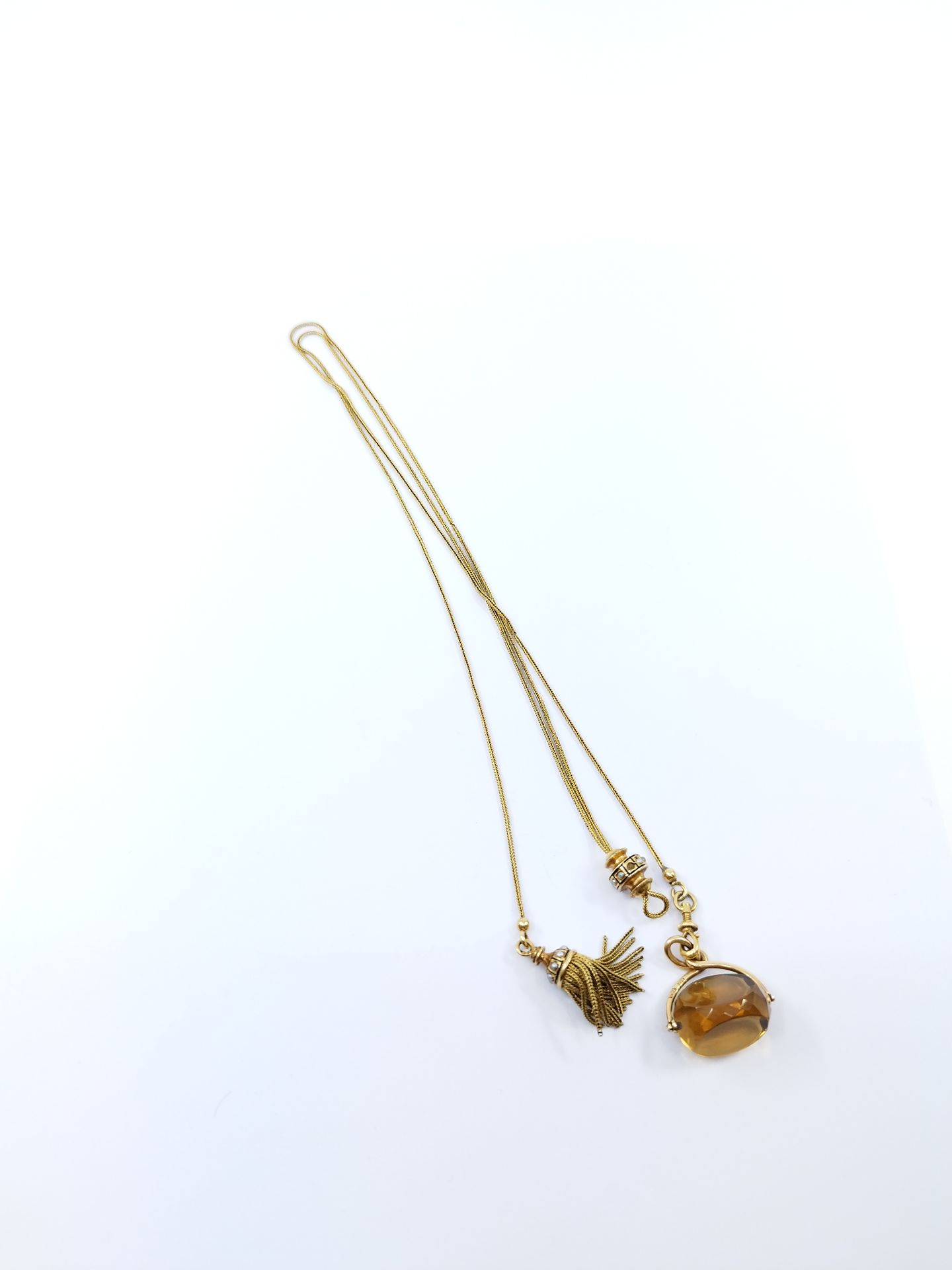 Null FRENCH WORK

ELEMENT OF CHATELAINE accompanied by a faceted citrine (damage&hellip;