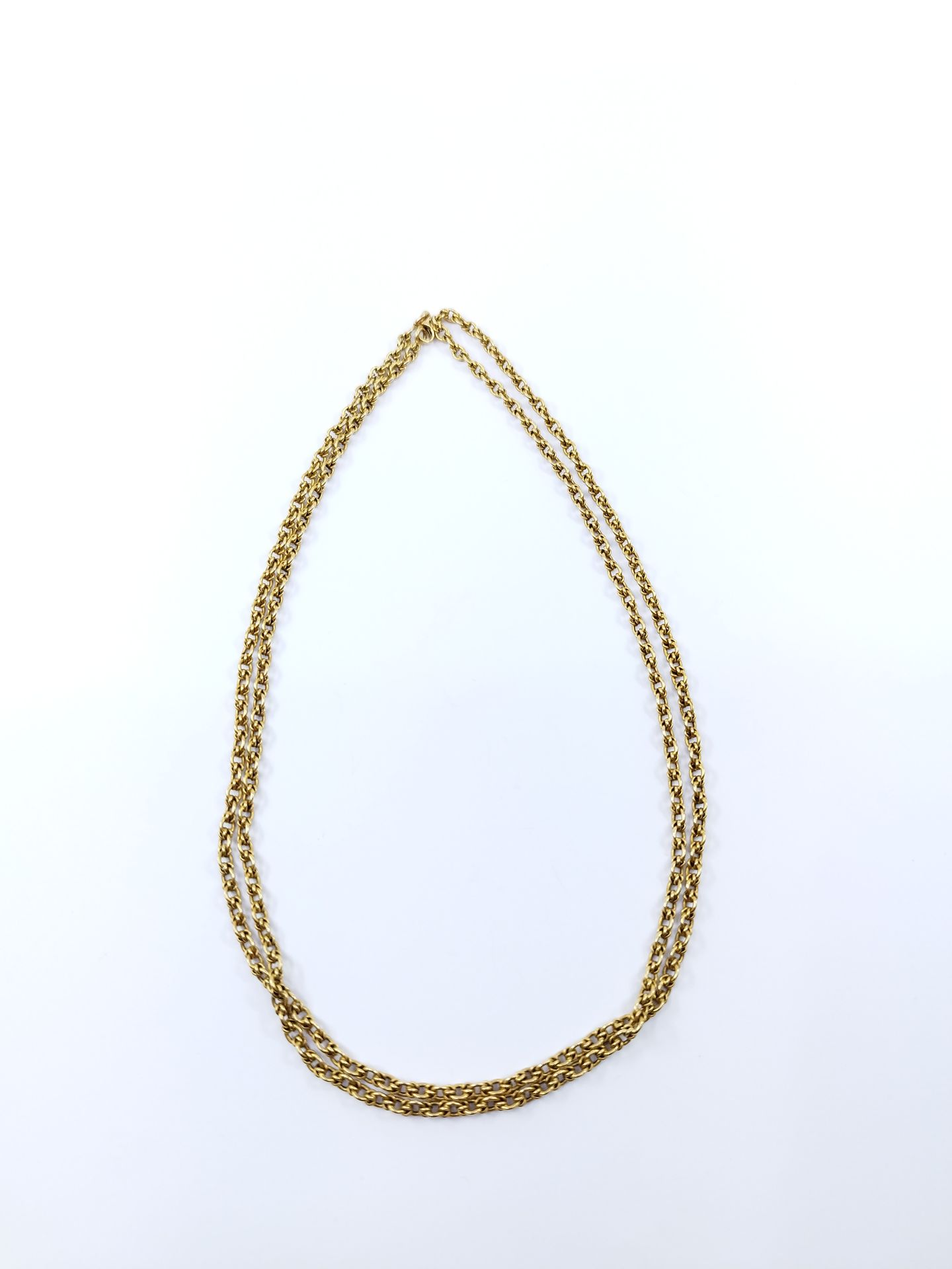 Null Long necklace in yellow gold 750°. 

Owl hallmark

Weight : 13,21 g