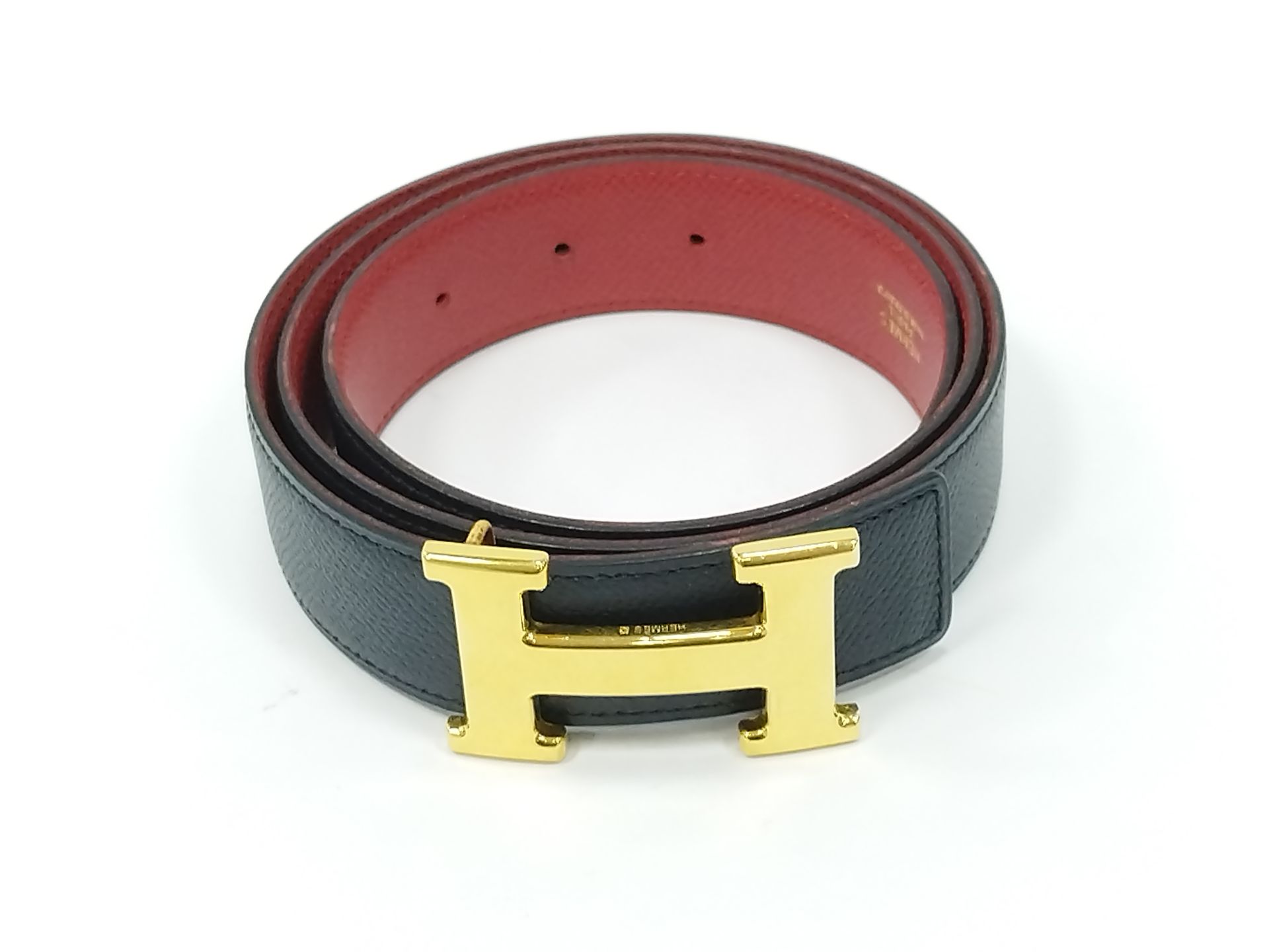 Null HERMES PARIS

Midnight blue grained leather belt, red reversible, gold "H" &hellip;