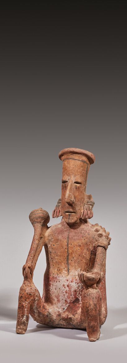 Null Seated figure

He is holding a command staff in his right hand and a bowl i&hellip;
