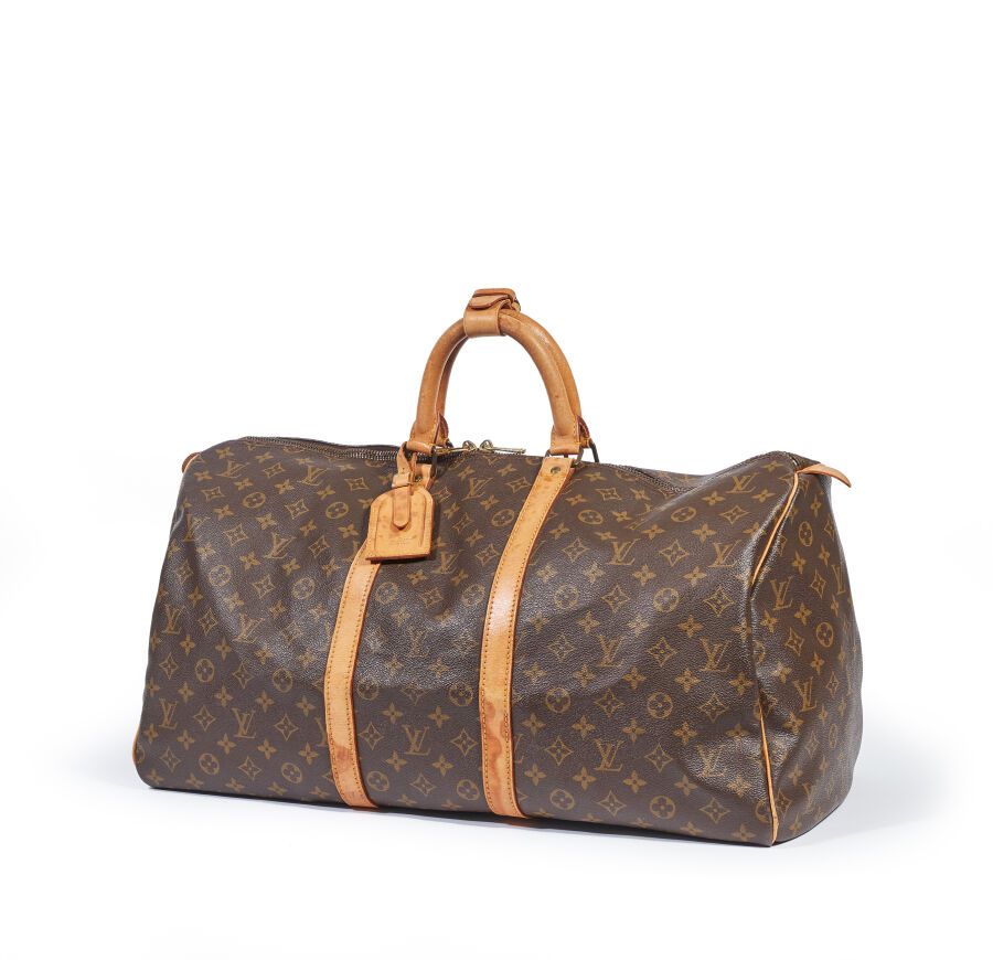 Null Louis VUITTON, circa 1983

Sac Keepall en toile monogram et cuir nature, do&hellip;