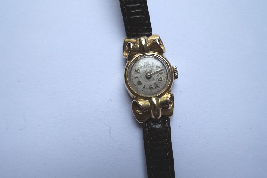 Null Montre bracelet de dame, la montre de forme ronde en or jaune 750 millièmes&hellip;