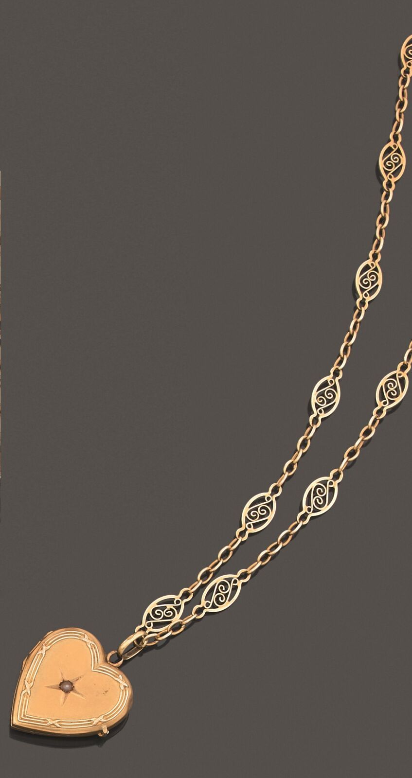 Null Necklace articulated in yellow gold 750 thousandths holding in pendant an o&hellip;