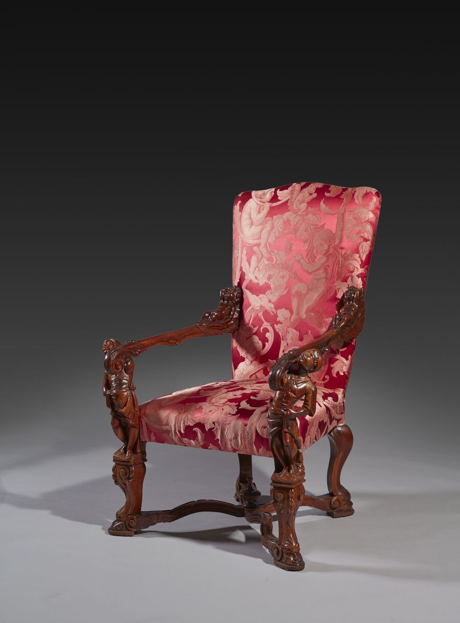 Null 一把胡桃木雕刻的礼仪扶手椅，有一个高高的平背，扶手上有水手和孩子的形象。
以安德烈-布鲁斯托隆（1662-1732）的品味。
威尼斯，19世纪。
高度&hellip;