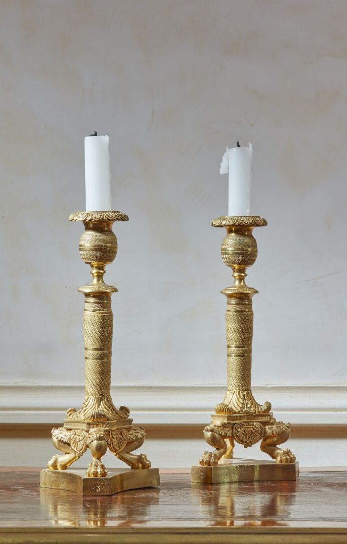 Null Pair of tripod ormolu torches, the fluted shaft finished with lion claws re&hellip;