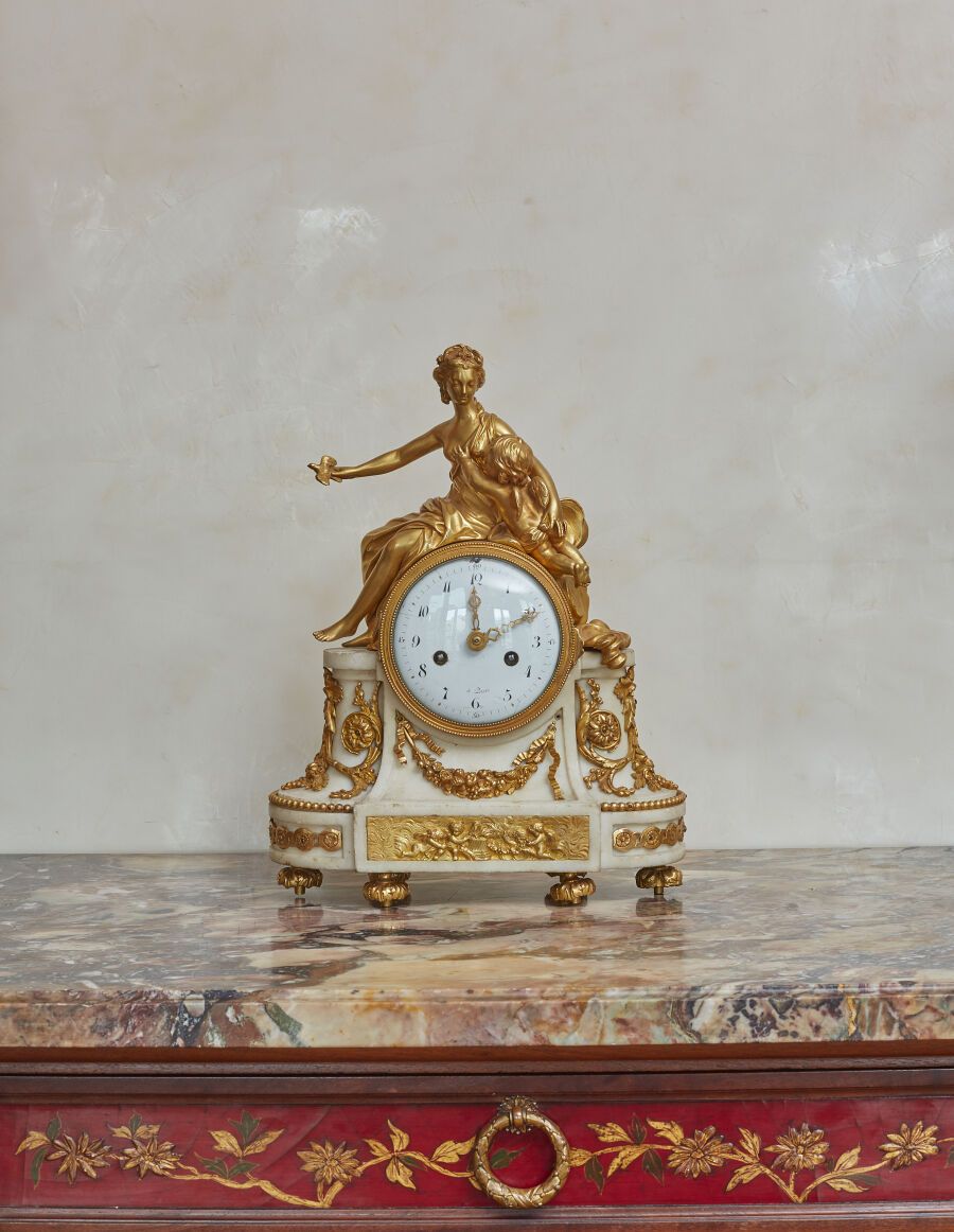 Null Pendule en bronze doré et marbre blanc à décor de Vénus et l'Amour ; (accid&hellip;