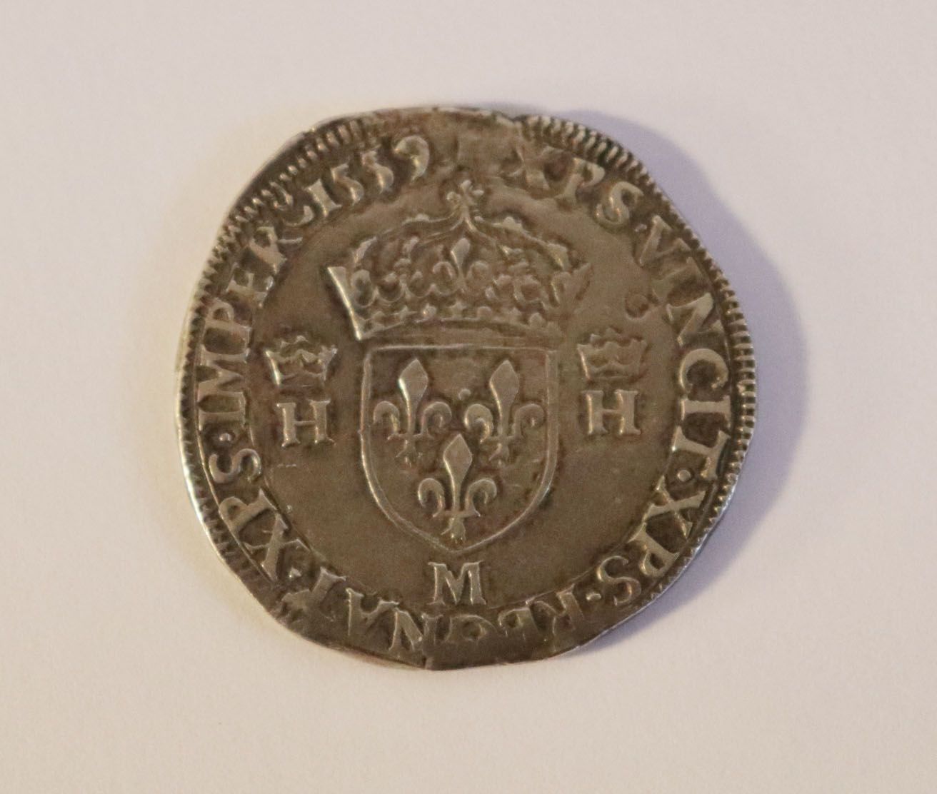 Null Henri II, teston 5e type, 1559 M = Toulouse. Dy.1031

Poids: 9,5 g