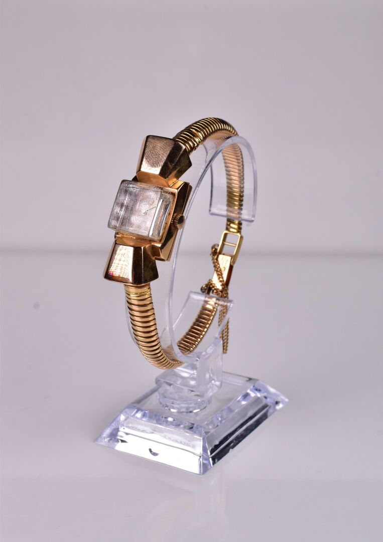 Null Montre bracelet de dame en or jaune 18K 750/1000e, boitier tank rectangle s&hellip;