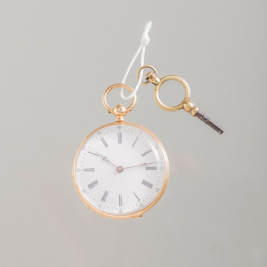 Null NECK WATCH in yellow gold and key Gross weight 28 g