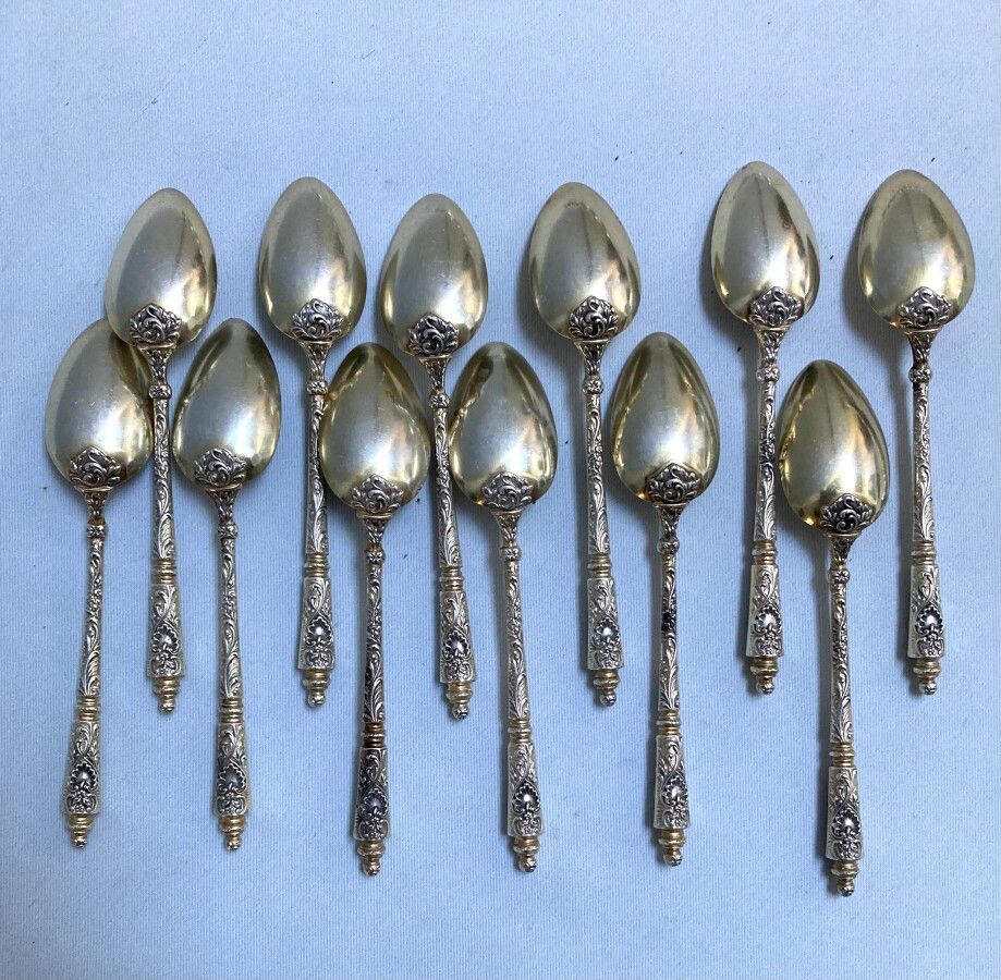 Null Set of twelve silver and silver-gilt TEA SPoons, Russian handle

Minerva. G&hellip;