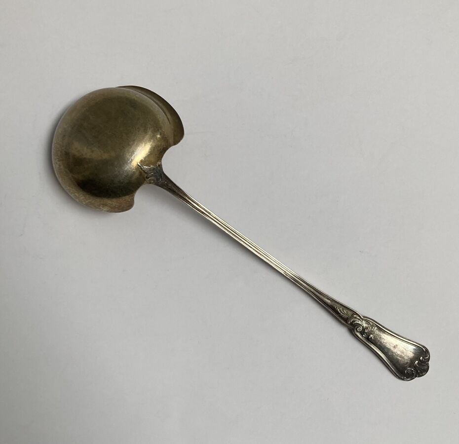 Null Silver and silver-gilt creamer spoon, foliated filets model

Minerva

L.: 2&hellip;