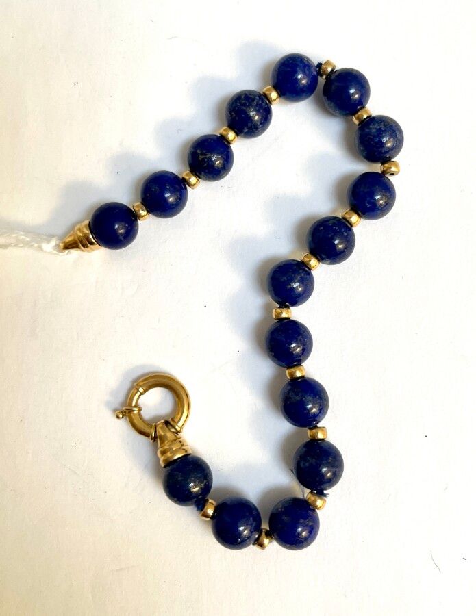 Null BRACELET en or et perles de lapis lazuli