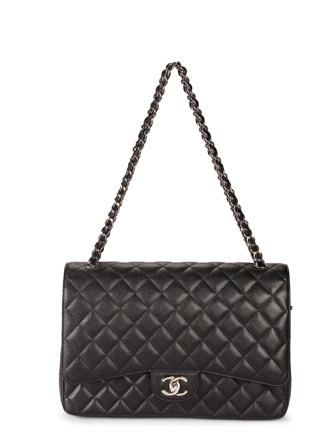 Chanel, Maxi Classic, a black lambskin flap bag, no. 159…