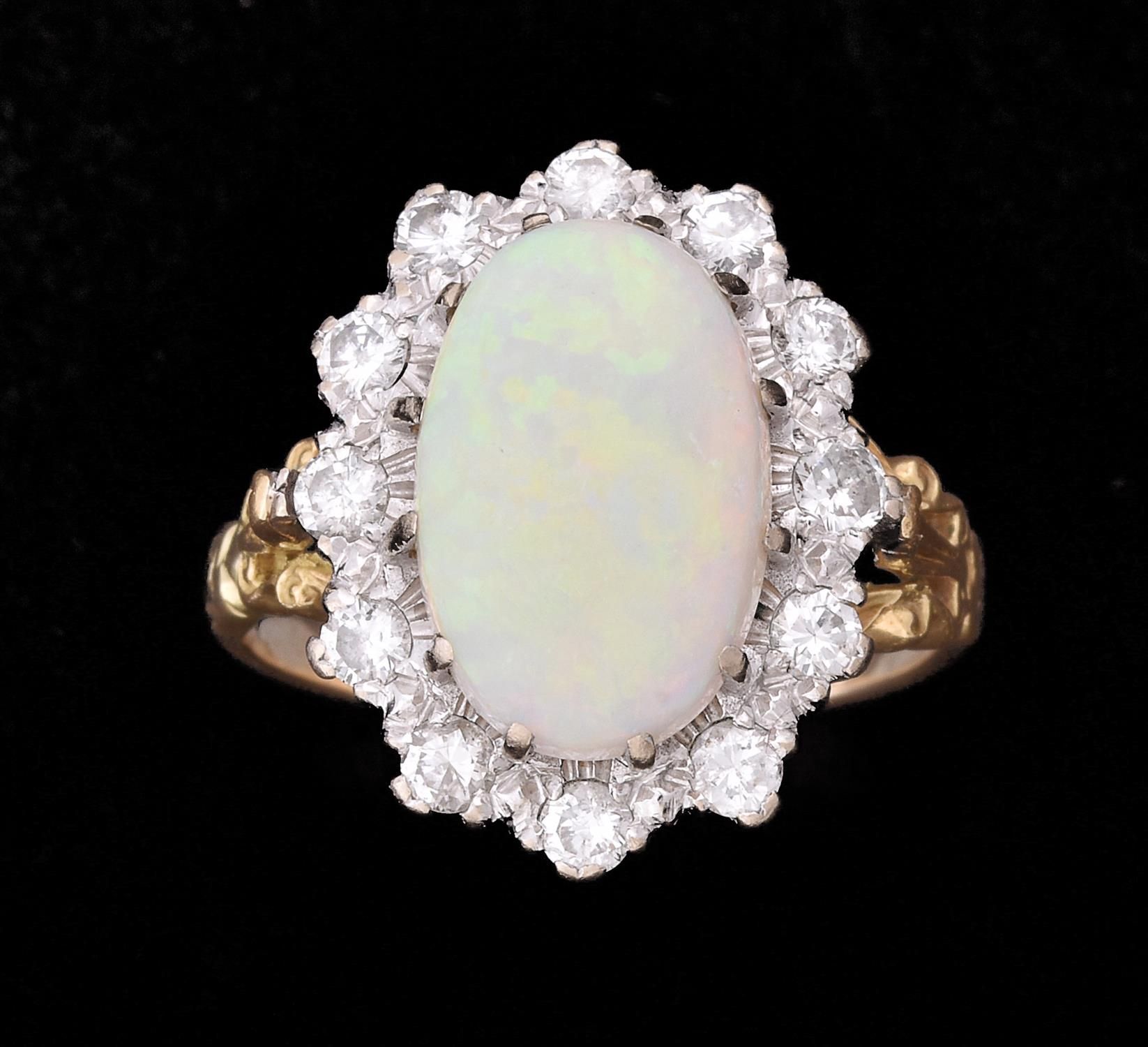 An opal and diamond cluster ring 蛋白石和钻石戒指，椭圆形凸圆形蛋白石爪镶在明亮式切割钻石周围，共约0.72克拉，手指尺寸R 1&hellip;