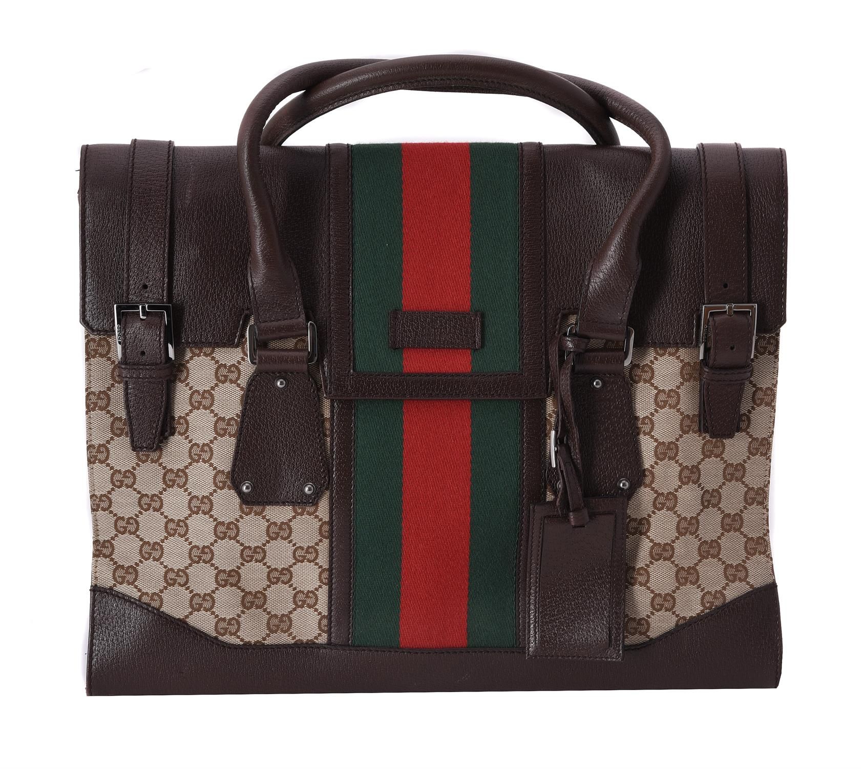 Gucci, a leather and canvas handbag Gucci, bolso de cuero y lona, con asas gemel&hellip;