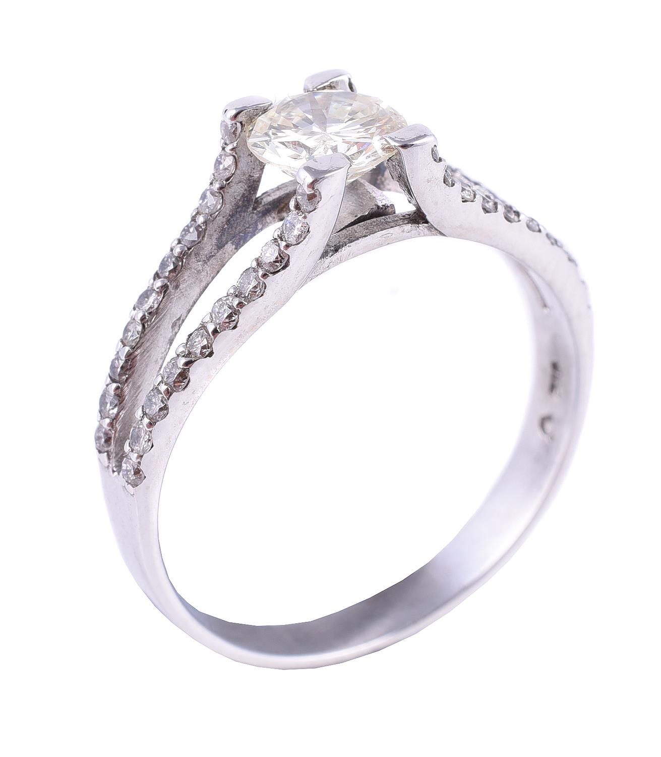 A single stone diamond ring A single stone diamond ring, the principal brilliant&hellip;