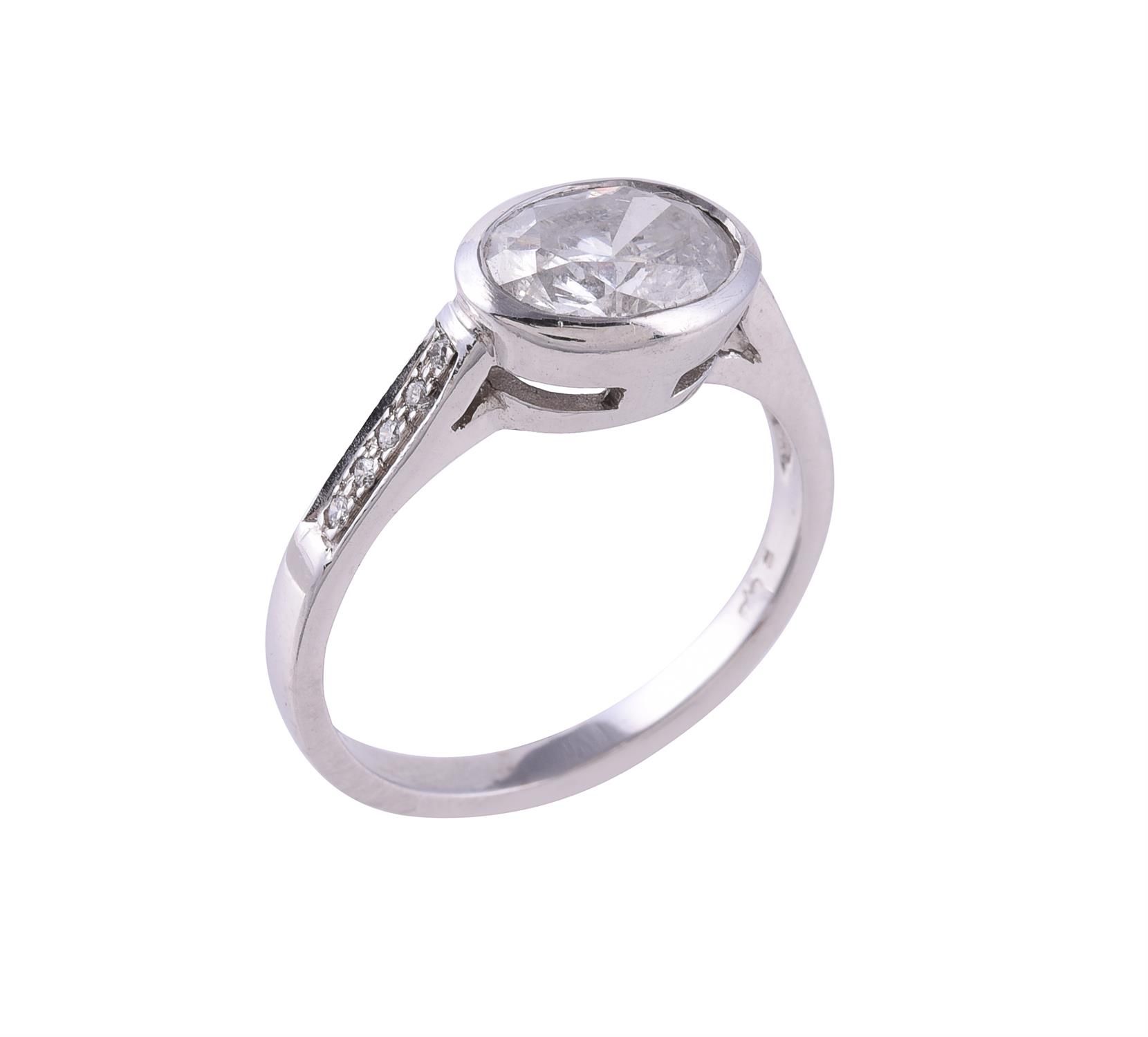 A single stone diamond ring A single stone diamond ring, the oval modified brill&hellip;