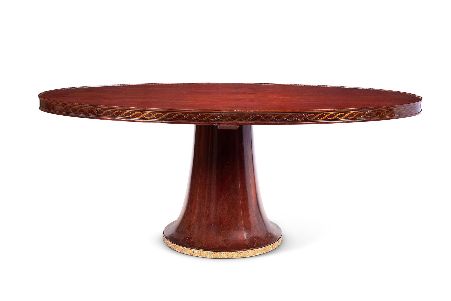 AN ITALIAN BRASS MOUNTED MAHOGANY DINING TABLE ATTRIBUTED TO PAOLO BUFFA (B.1903&hellip;