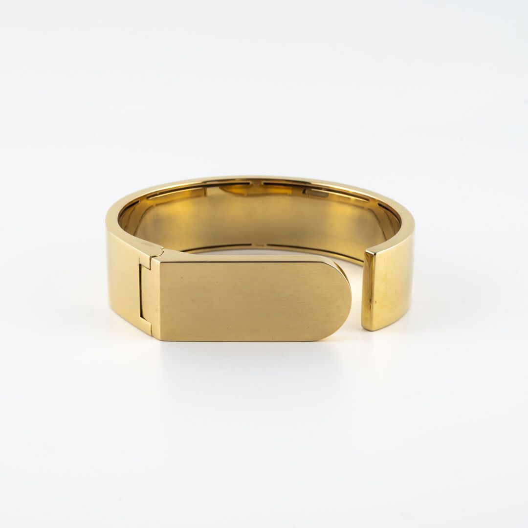 GARRARD Bracelet manchette en or jaune (750), ouverture à charnière. 

Probablem&hellip;