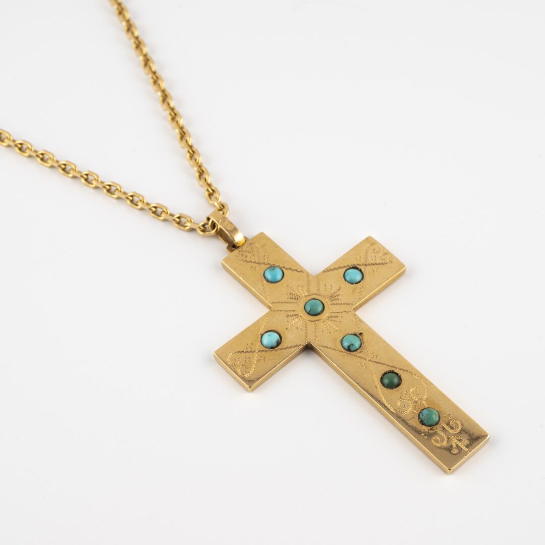 Null Chaine en or jaune (750) à maille forçat retenant une croix en or jaune (75&hellip;