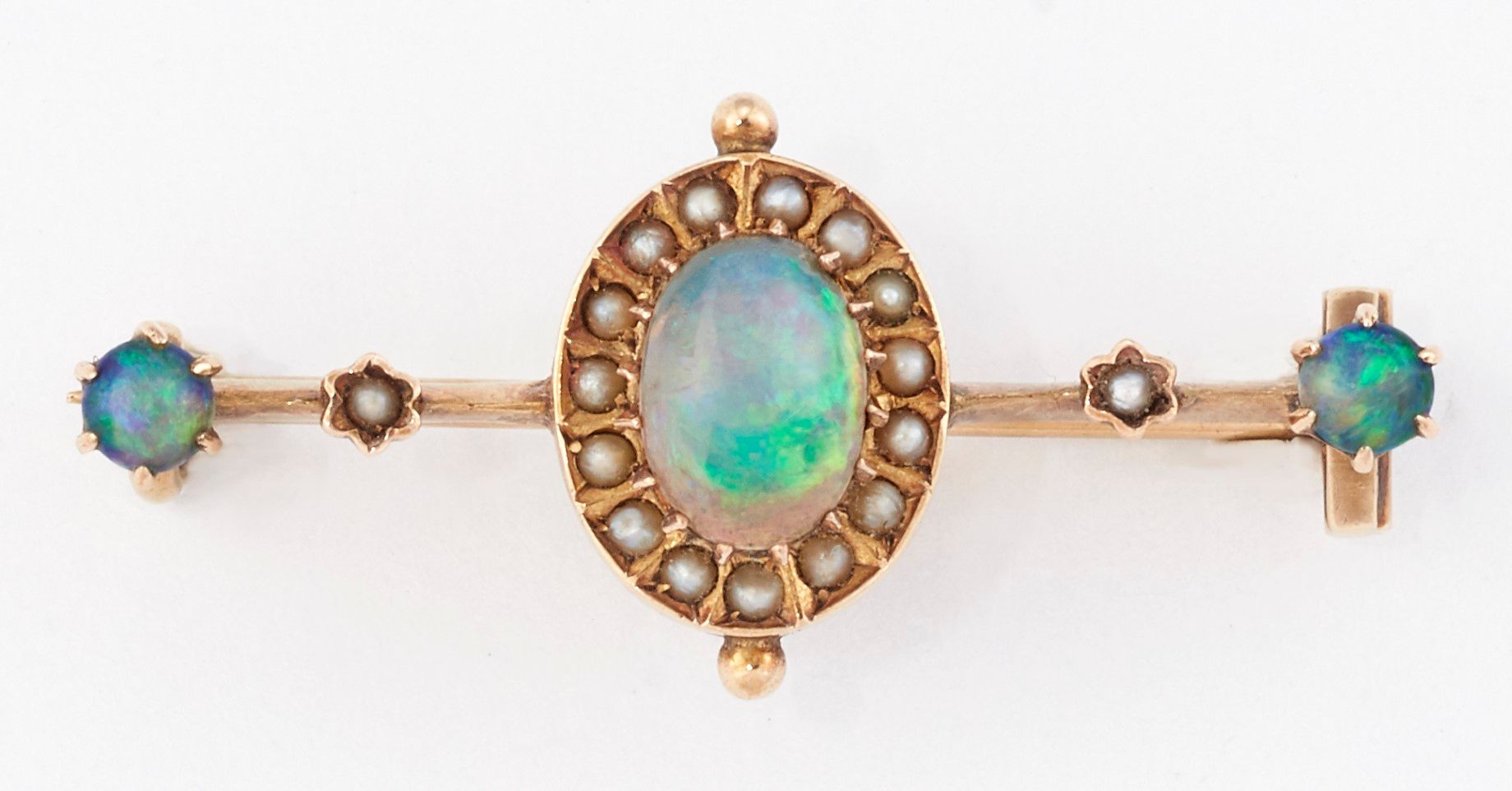 Null A LATE VICTORIAN BLACK OPAL AND SEED PEARL BROOCH, an oval opal within a bo&hellip;