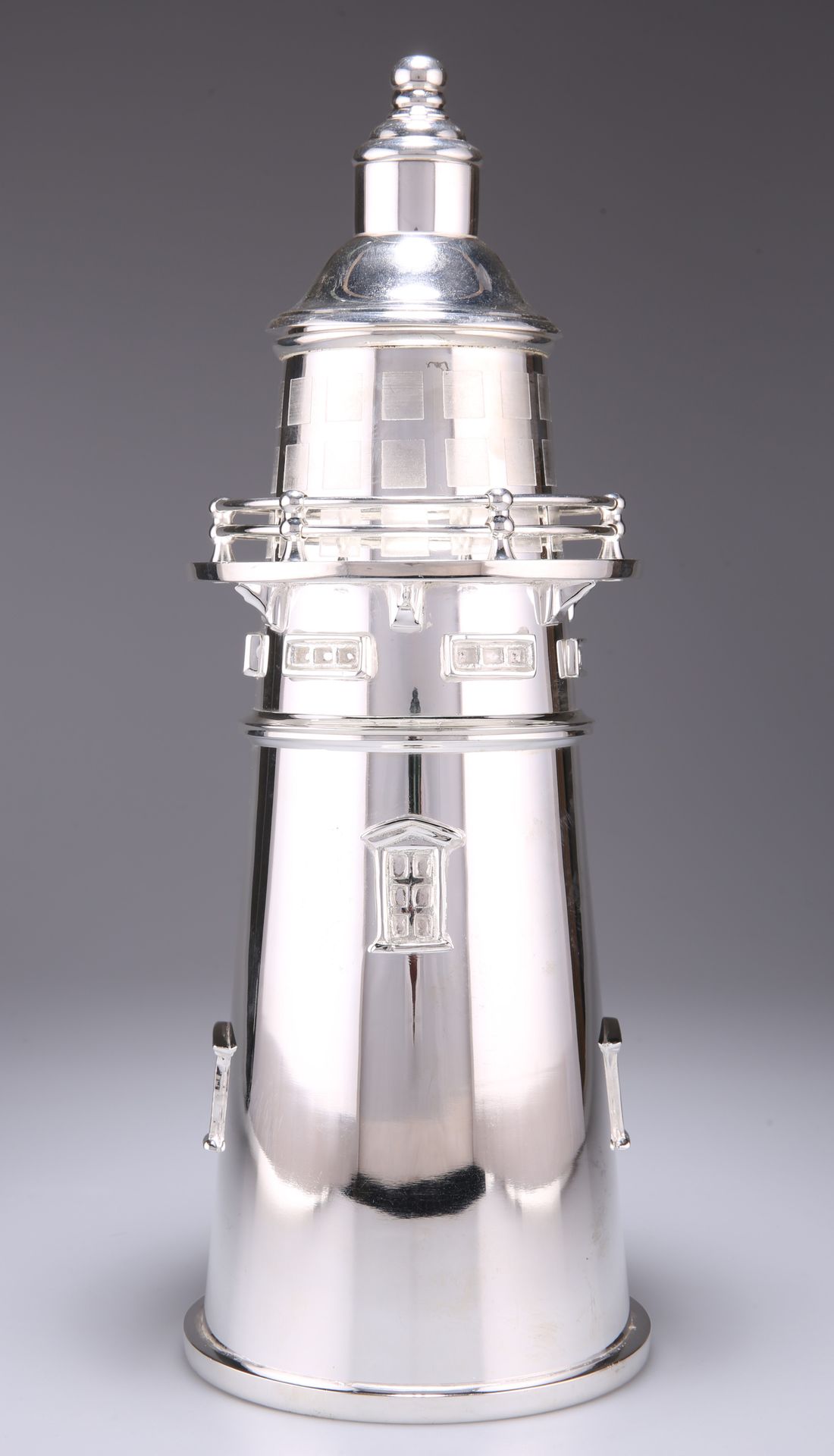 Null A LARGE SILVER-PLATED NOVELTY COCKTAIL SHAKER, in the form of a lighthouse.&hellip;