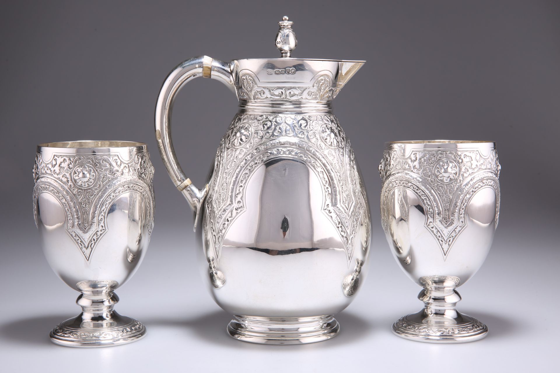 Null A VICTORIAN SILVER JUG AND PAIR OF GOBLETS, by Richard Martin & Ebenezer Ha&hellip;