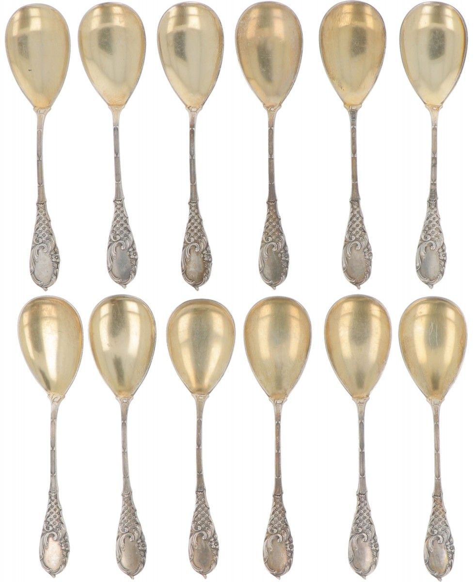 (12) piece set of ice cream spoons silver. With molded decorations and partly gi&hellip;
