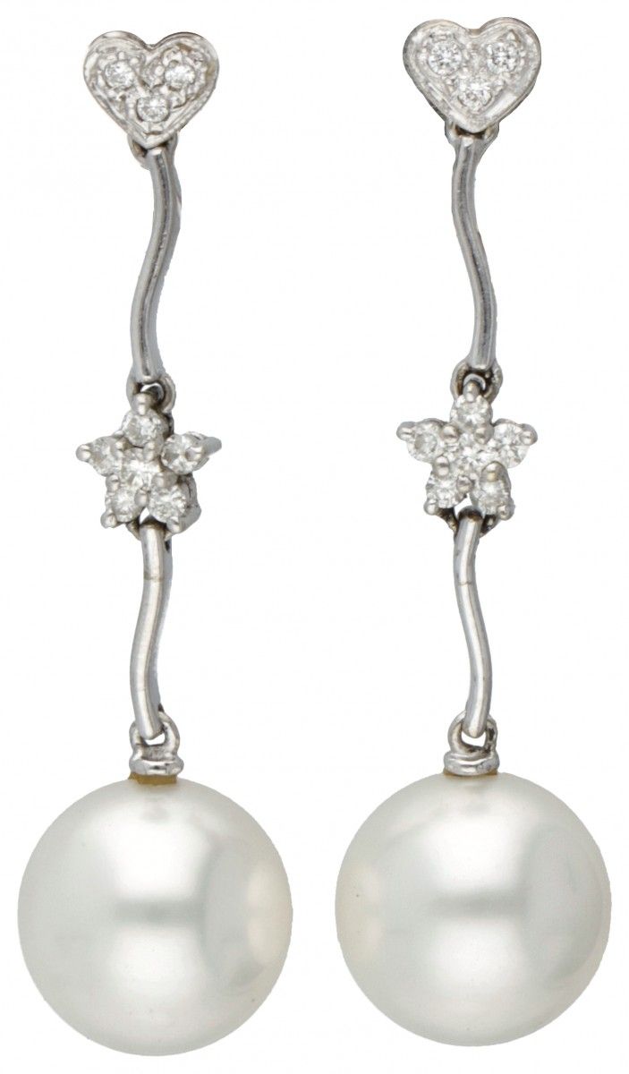 14K. White gold earrings set with approx. 0.17 ct. Diamonds and freshwater pearl&hellip;