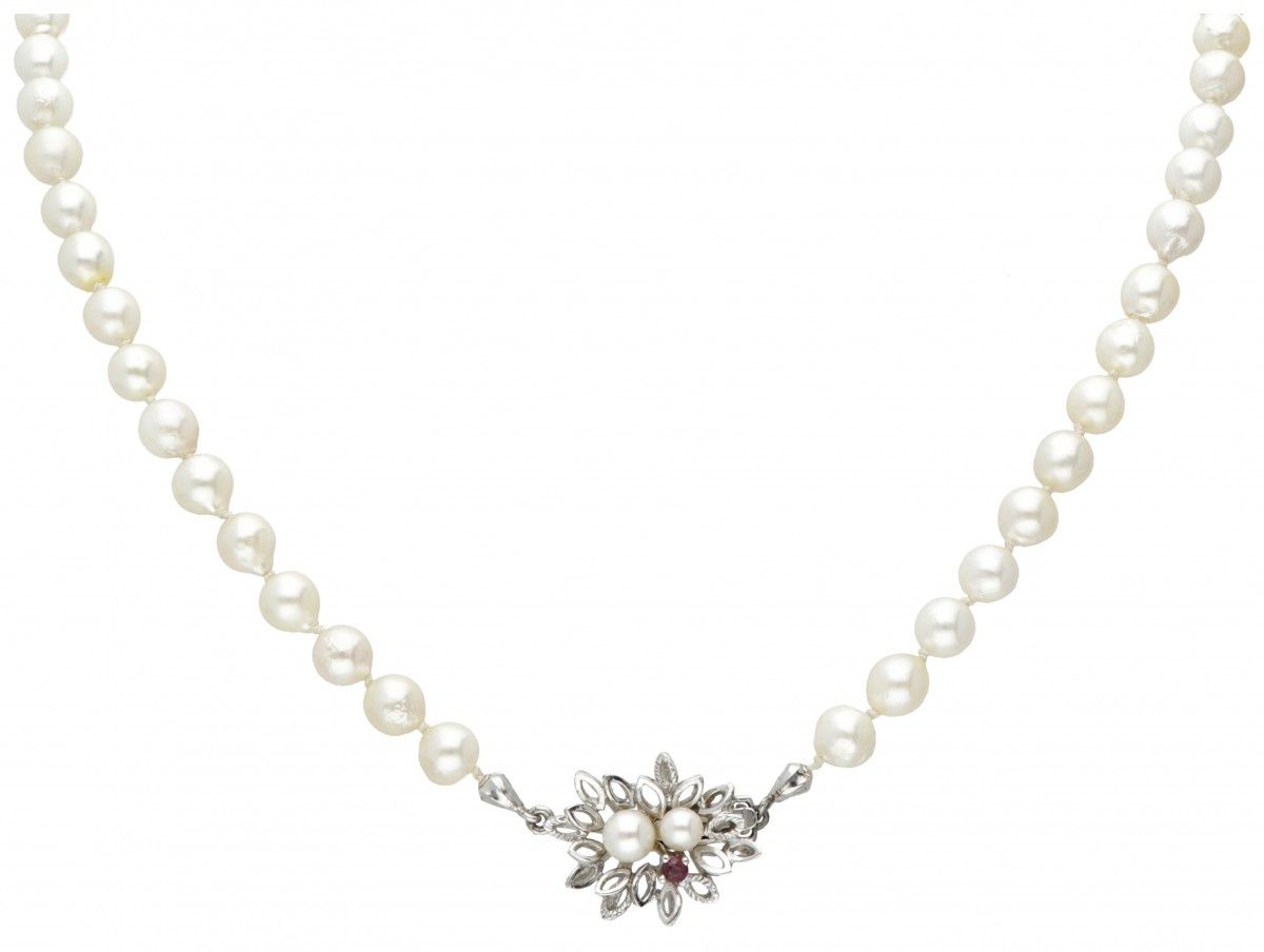 Single strand pearl necklace with a 14K. White gold closure set with pearl and r&hellip;