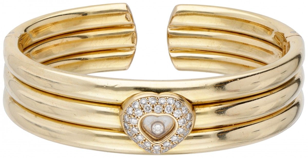 18K. Yellow gold Chopard 'Happy Diamonds' bangle bracelet. Poinçons : Chopard, 7&hellip;