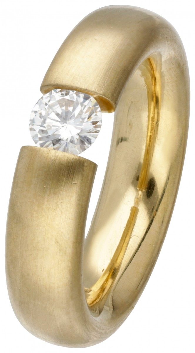 18K. Classic yellow gold satin Niessing 'Spannring' set with approx. 0.44 ct. Di&hellip;