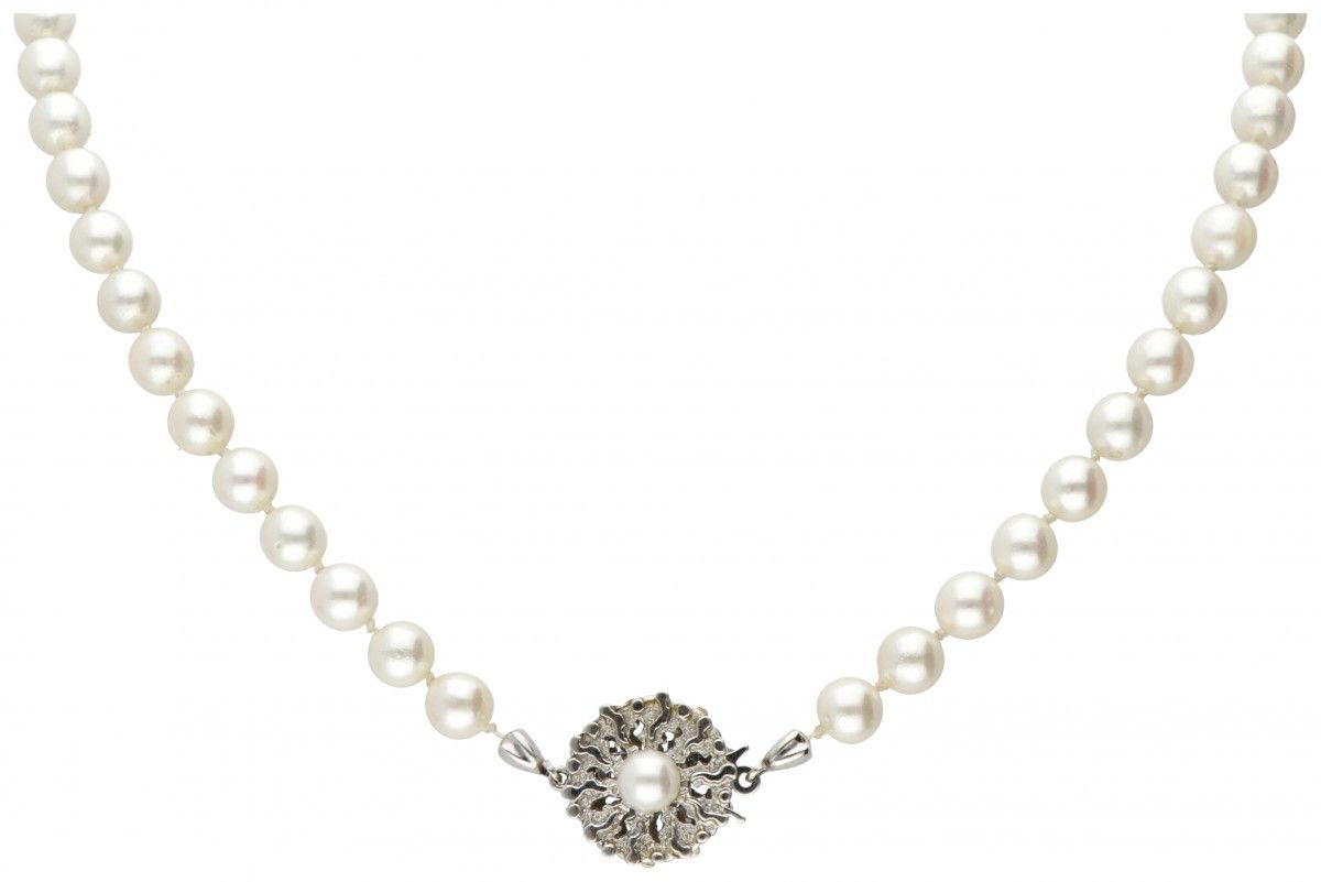 Single strand pearl necklace with a 14K. White gold closure set with cultured pe&hellip;