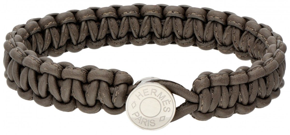 Hermès 'Twill Kid' braided leather bracelet. Hermès Paris. Longueur : 19,5 cm. P&hellip;