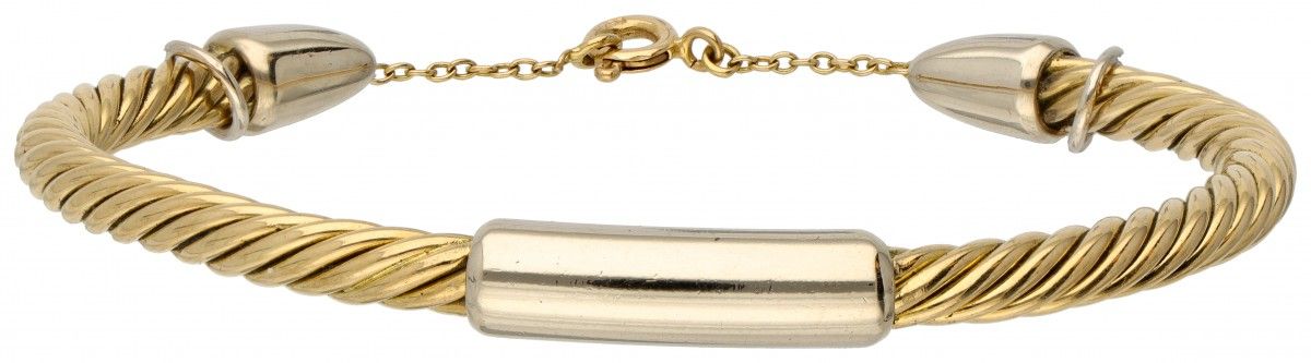 18K. Bicolor gold Pomellato bangle bracelet. Avec chaîne de sécurité. Poinçons :&hellip;