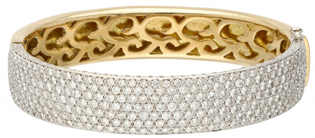 18K. Yellow gold pave bangle bracelet with openwork inside and set with approx. &hellip;
