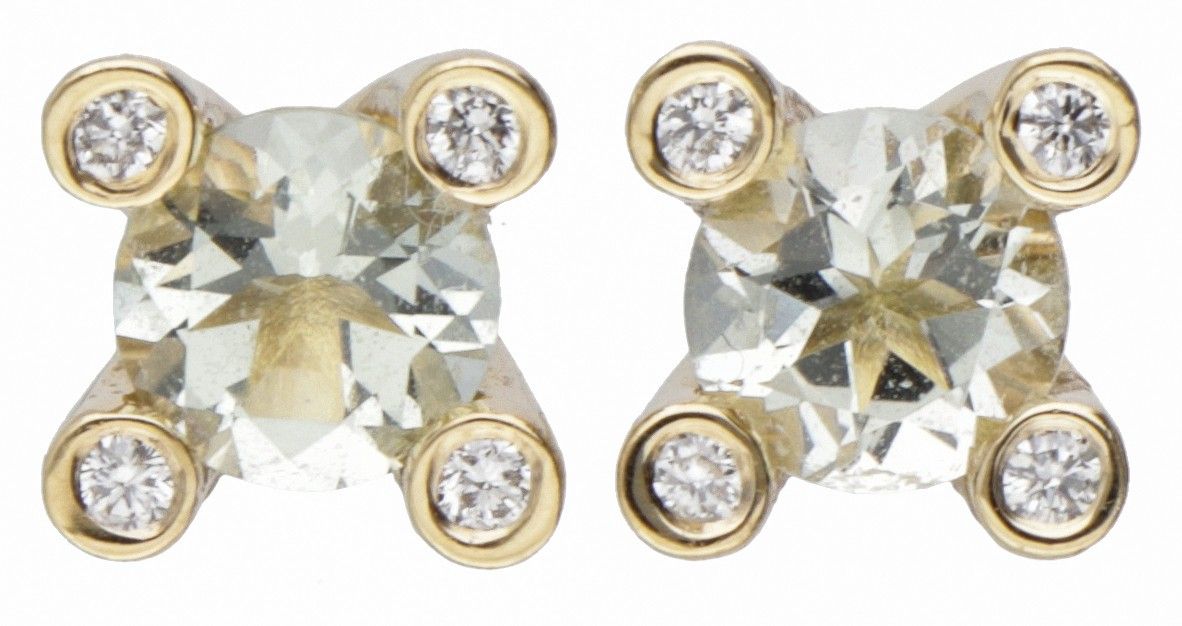 18K. Yellow gold Bron earrings set with approx. 0.72 ct. Aquamarine and approx. &hellip;