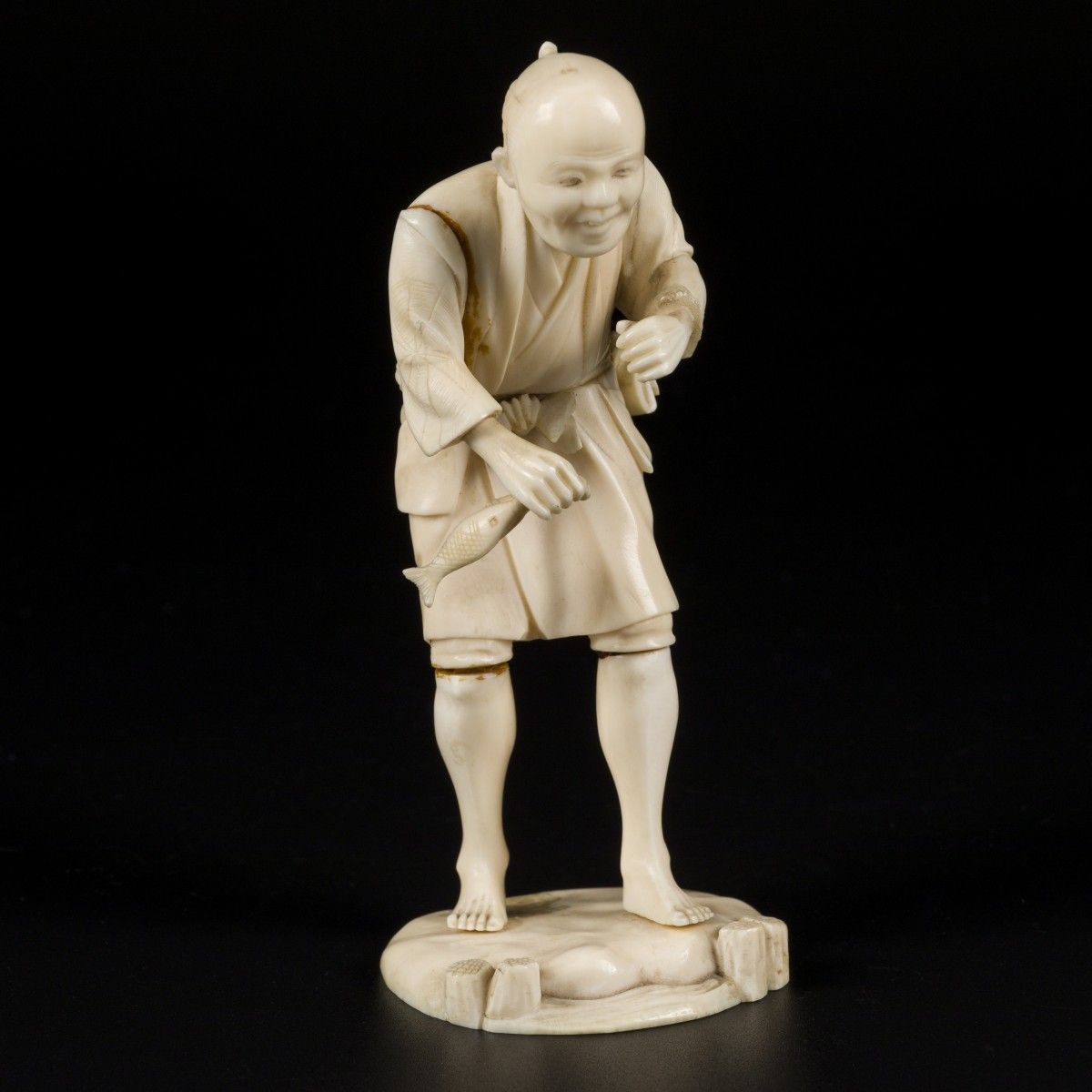 An ivory sculpture in the shape of a fisherman, Japan, late Meji period. Estimat&hellip;