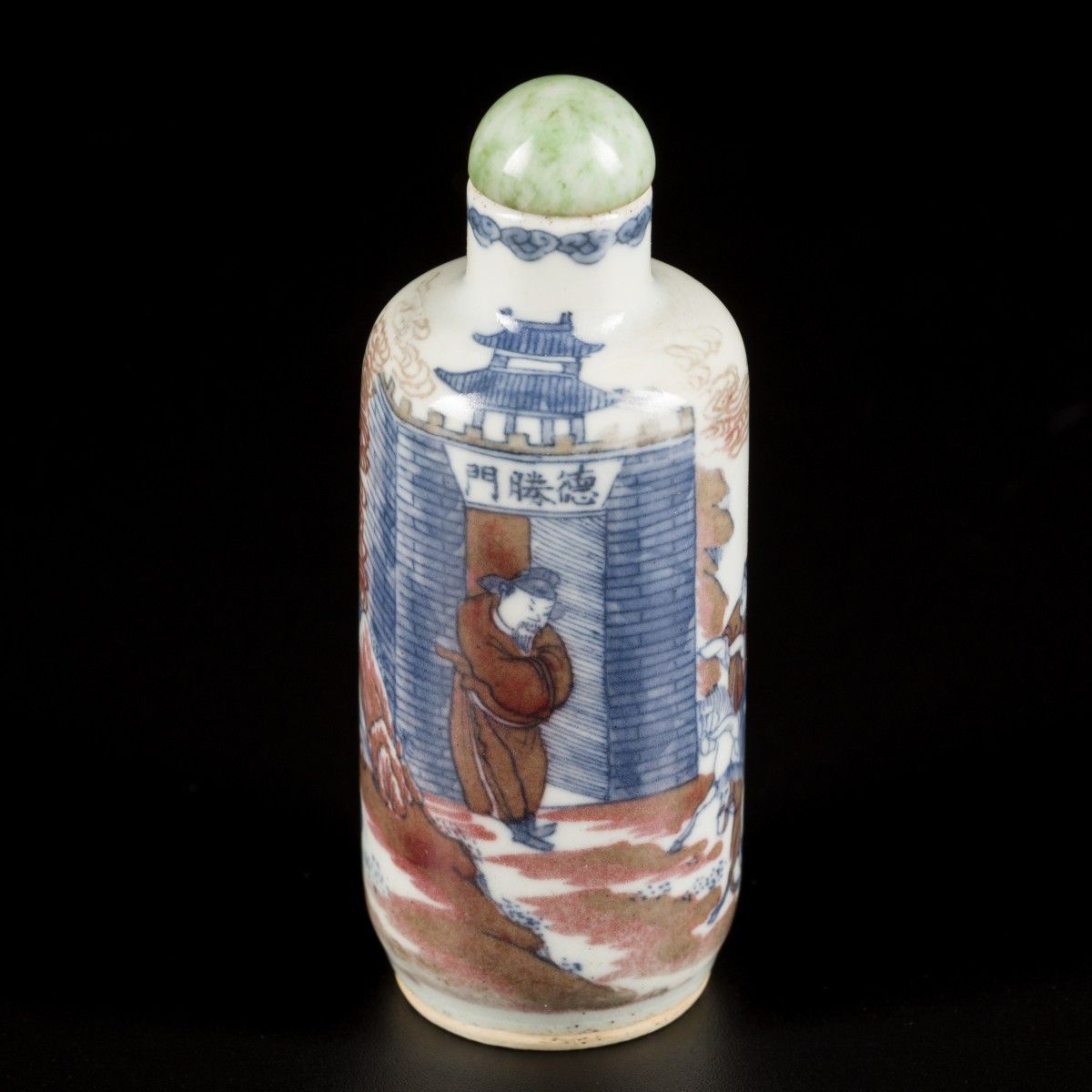 A porcelain iron-red snuff bottle decorated with warriors, China, 19th century. &hellip;
